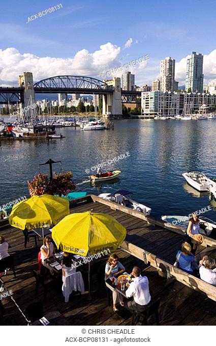 False Creek patio filled with summer time revelers, British Columbia, Canada