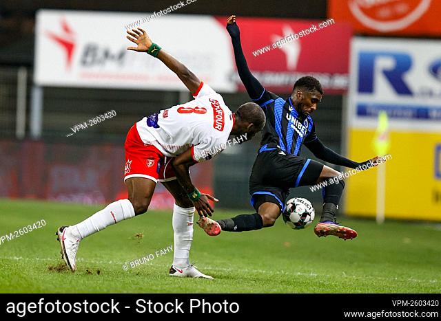 Mouscron's Jean Onana and Club's Clinton Mata fight for the ball during the Jupiler Pro League match between Royal Excel Mouscron and Club Brugge KV