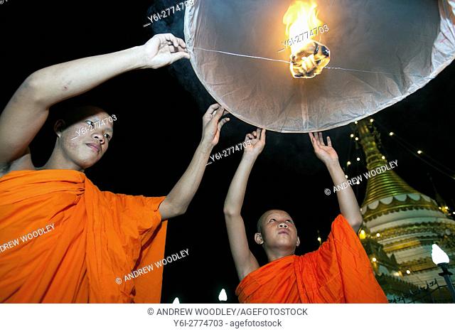 Monks launch hot air balloon Loy Krathong festival Mae Hong Son Thailand