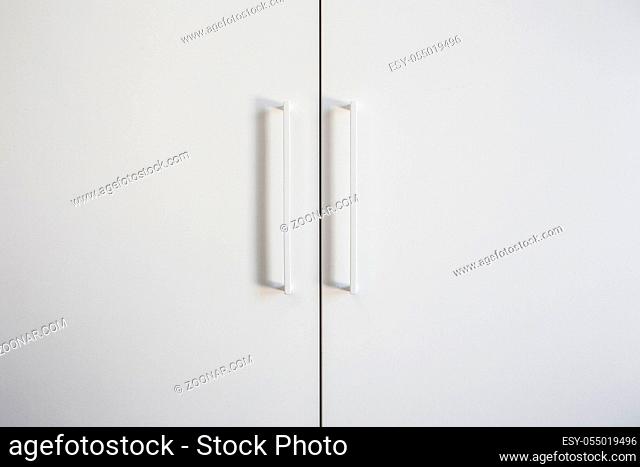 White closet doors wood closeup, modern design background texture