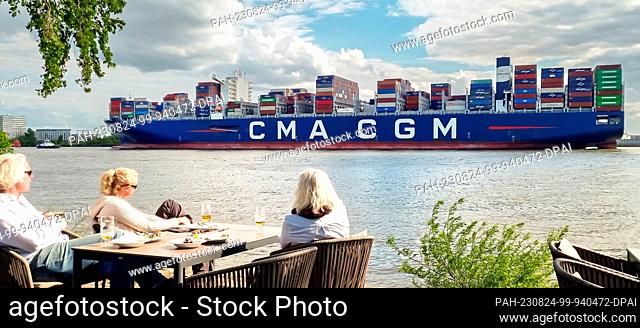 19 June 2023, Hamburg: A container ship of the French shipping company CMA CGM enters the port of Hamburg upstream from Blankenese