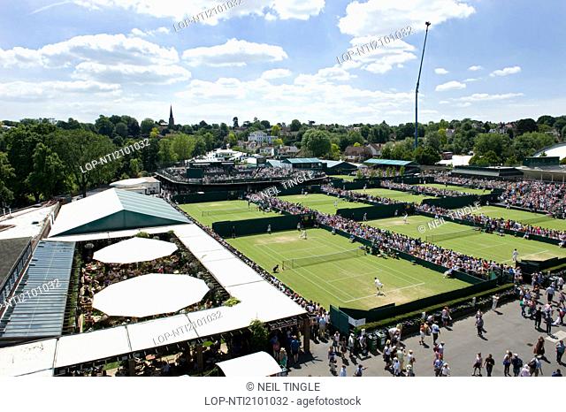 England, London, Wimbledon. View of the cafe pergola and courts 7, 6 and 5 at the Wimbledon Tennis Championships 2010