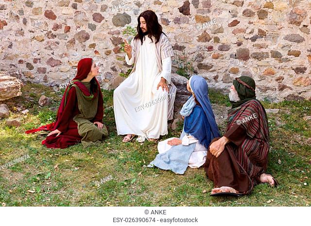 Jesus preaching to a group of people - historical reenactment