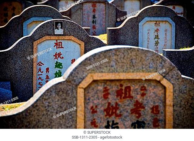 The Chines and Commonwealth cemeteries at Kananchaburi, Thailand. This cemetery is a monument to the some 700, 000 prisoners of war who died building a 22 km...