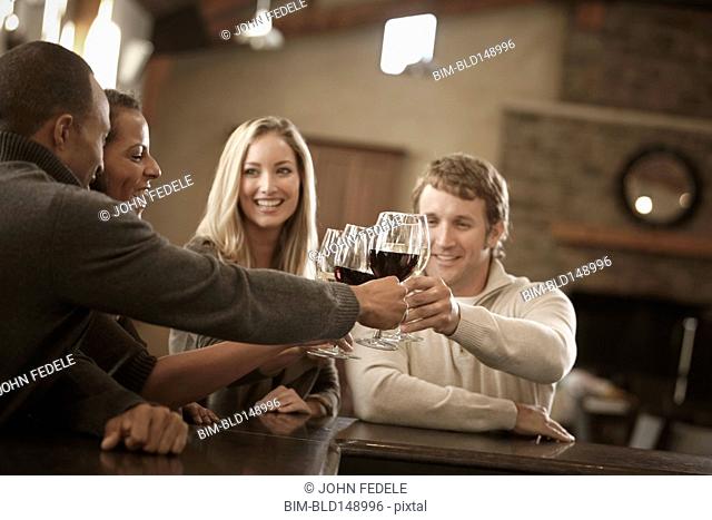 Friends drinking wine together