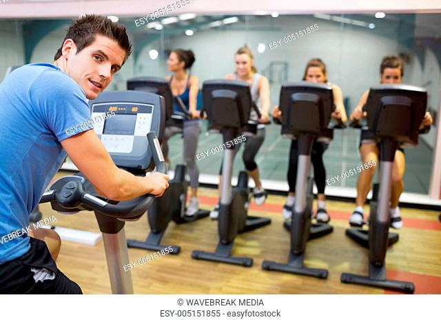 Male instructor at spinning class