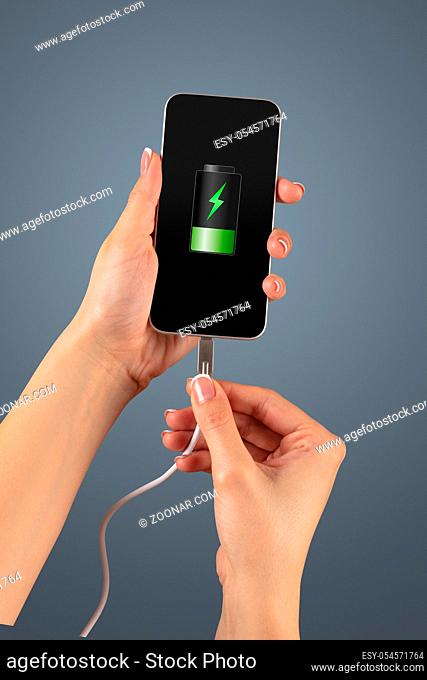 Elegant hand charging cellphone with low battery