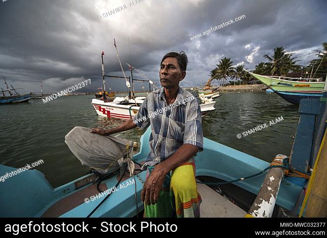 Fisherman Sudurikku Ganadsa, who is 57 years old. “Help Age International” gave him a loan to buy fishing nets. He has another loan which he used to repair the...