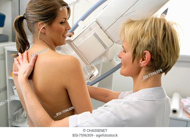 Model and health professional.Photo essay at Rouen University Hospital. Mammogram. Patient and woman technician