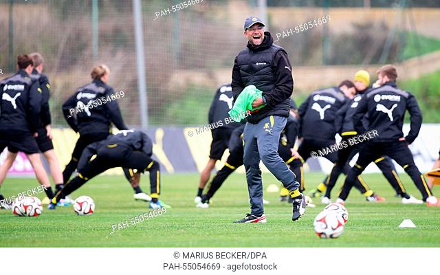 Borussia Dortmund's head coach Juergen Klopp laughs during a training session in La Manga, Spain, 16 January 2015. Borussia Dortmund stays in La Manga until 18...