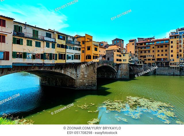 Medieval stone closed-spandrel segmental arch bridge Ponte Vecchio over Arno river in Florence, the capital city of Tuscany region, Italy