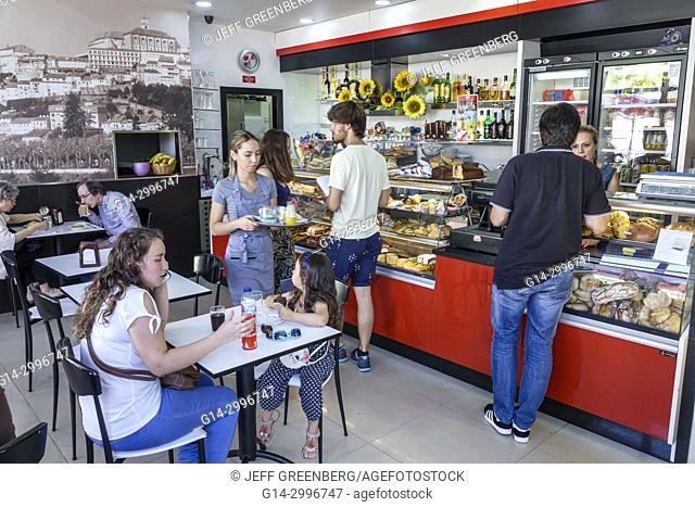 Portugal, Coimbra, University of Coimbra, Universidade de Coimbra, Padaria Pastelaria Universidade, bakery, cafe, counter, restaurant, sandwiches, pastries, man