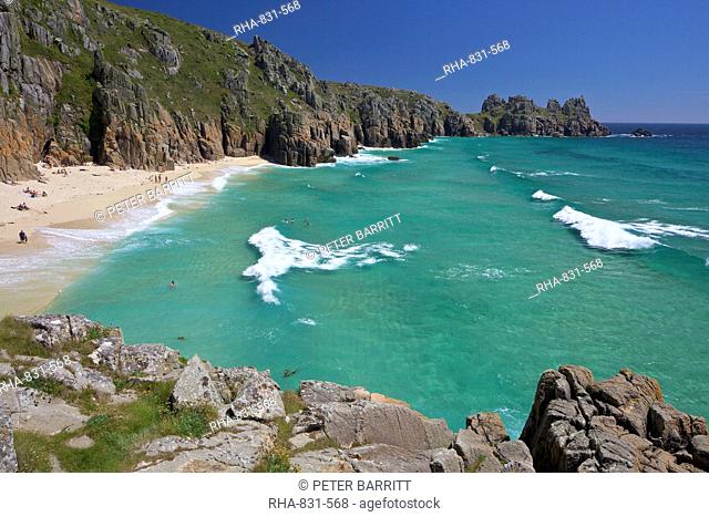 Surf and turquoise sea at Pednvounder beach in summer sunshine, Treen Cliff, near Porthcurno, Lands End Peninsula, West Penwith, Cornwall, England