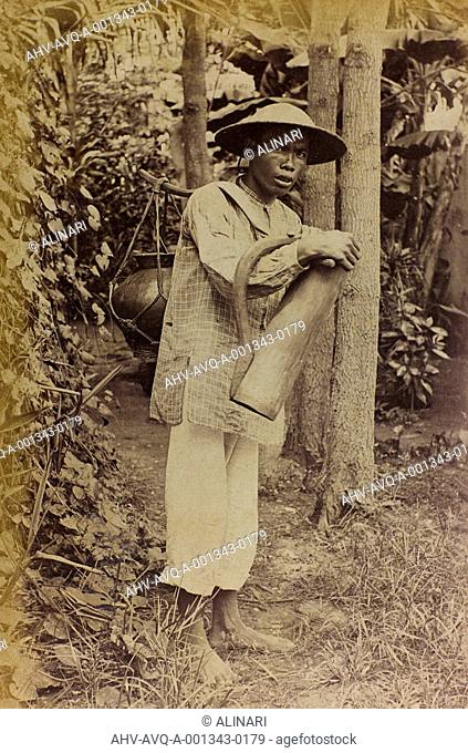 Chinese young man carrying a container, shot 1890-1900