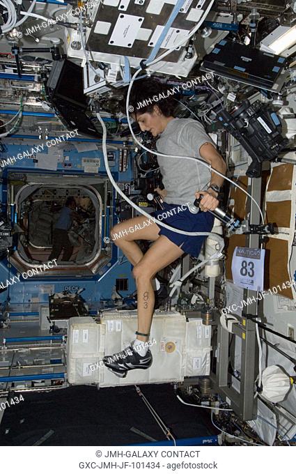 NASA astronaut Sunita Williams, Expedition 33 commander, exercises on the Cycle Ergometer with Vibration Isolation System (CEVIS) in the Destiny laboratory of...
