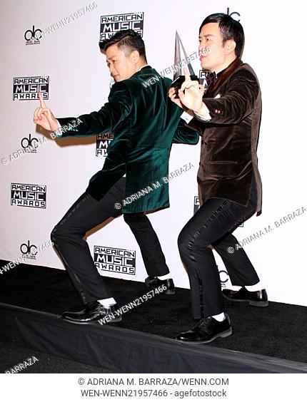 2014 American Music Awards - Press Room held at the Nokia Theatre L.A. Live Featuring: Xiao Yang, Wang Taili Where: Los Angeles, California