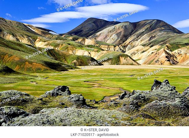 River course surrounded by colorful mountains and lava fields, Landmannalaugar, Highlands, Southern Island, Iceland, Europe