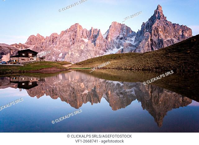 Dolomites Alps, Pale di San Martino reflecting on water, Baita Segantini, Trentino Alto Adige, Italy