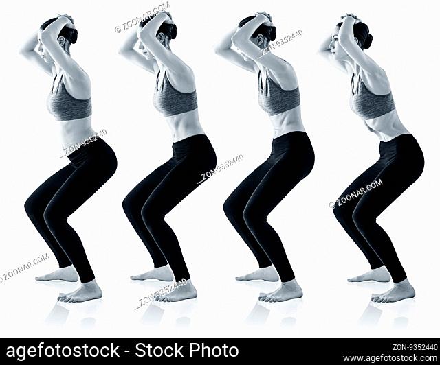 Sporty beautiful young woman practicing Uddiyana Bandha technique isolated on white