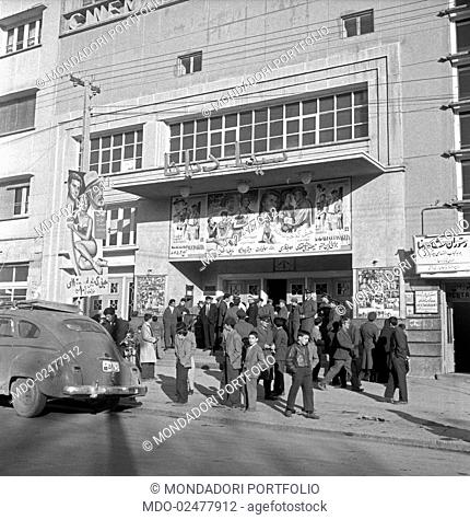 Some people standing outside a cinema staging the film The Miller's Beautiful Wife. Tehran, 1956