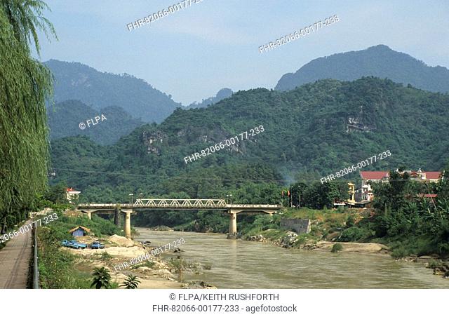 Bridge over river, forested hills to north, Ha Giang, Ha Giang Province, North Vietnam