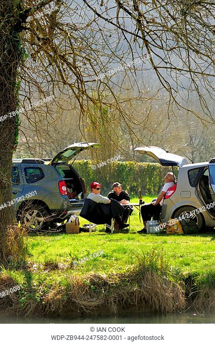 People picnic at Le Ceou River, Dordogne, France