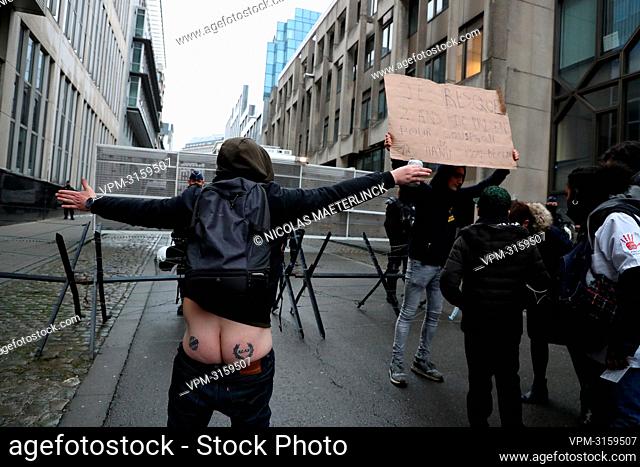 A protester shows his naked bum (with tattoos on it) during a protest against the health pass (Marche pour la Liberte Acte 3 - Mars voor Vrijheid Act 3) and...