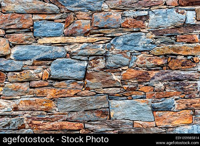 Slate slabs texture background. Pattern of black slate wall
