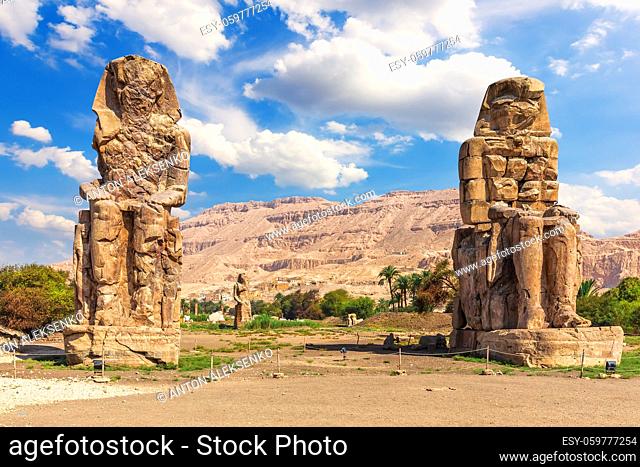 The Colossi of Memnon in the Theban Necropolis, statues of the Pharaoh Amenhotep, Luxor, Egypt