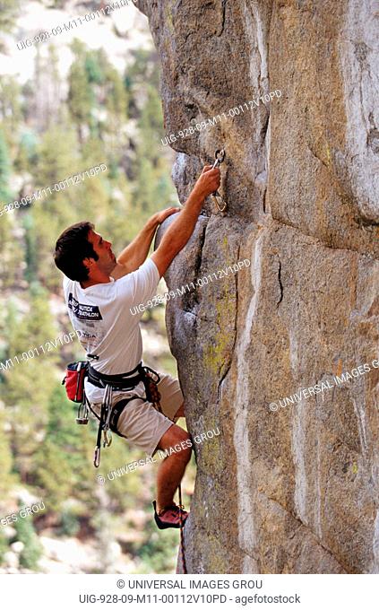 Colorado, Boulder. Man Climbing Empire Of The Frenceless On Easter Rock In Boulder Canyon