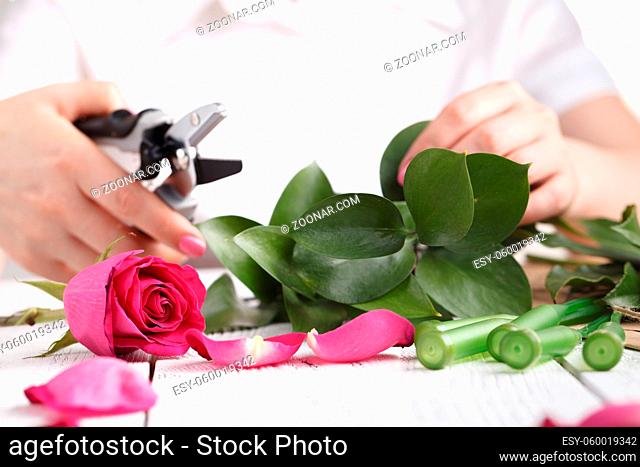 Florist, Woman making beautiful flower arrangement