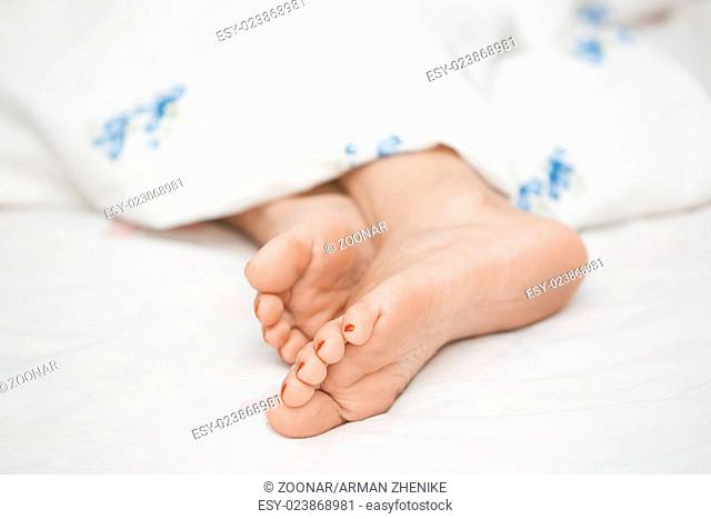 Feet of sleeping woman