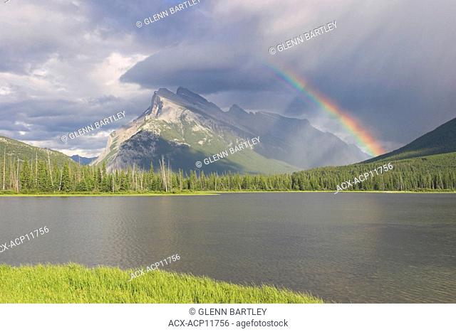 A beautiful rainbow over Mount Rundle in Banff national park, Alberta, Canada
