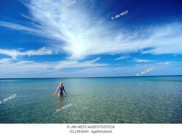 Pictured Rocks National Lakeshore, Michigan - Susan Newell swims in Lake Superior at Pictured Rocks National Lakeshore in Michigan's Upper Peninsula  MR