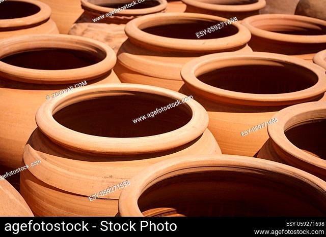 many clay pots, empty clay pot collection -