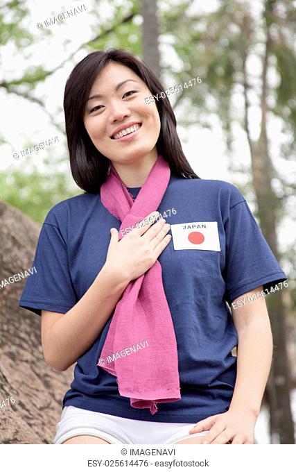 Young woman supporting the Japan women's national football team