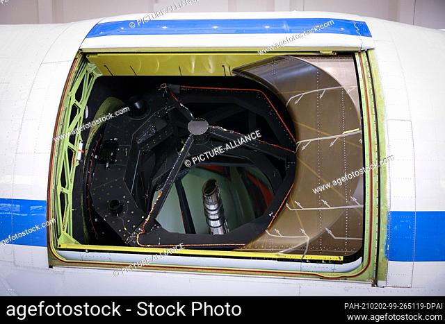 26 January 2021, Hamburg: Behind the open hatch, the reflecting telescope of the flying stratospheric observatory ""SOFIA"" can be seen inside a converted...