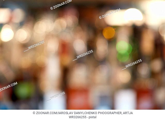 blur alcohol drinking bottle and glasses in the bar or pub