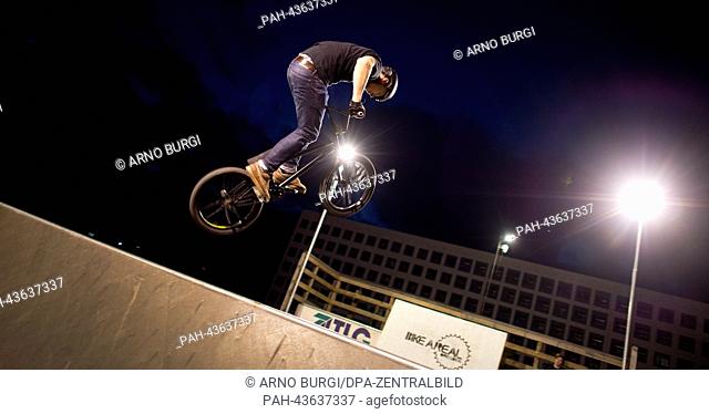 Christopher Wejner from Lutherstadt Wittenberg takes a jump in the mini ramp at the 'Anti.Winter.Jam.' at the Bike area in Dresden, Germany, 26 October 2013