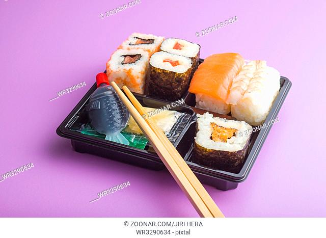 Eating set of sushi in box. Different types of sushi