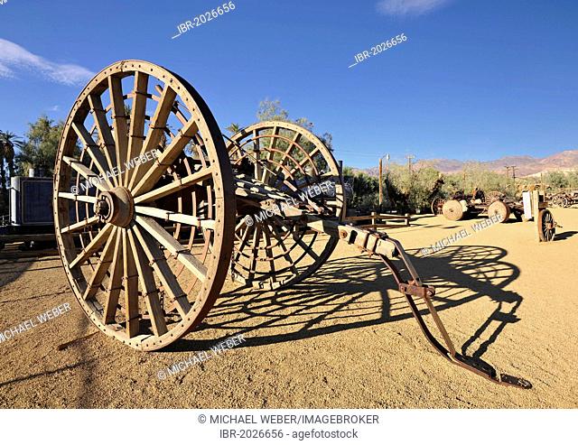 Logging wheels, carts for transporting felled trees, Borax Museum, Furnace Creek Ranch Oasis, Death Valley National Park, Mojave Desert, California