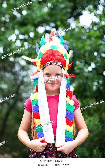 Girl wearing Indian headdress