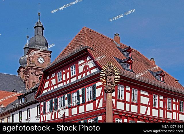 historic old town, market square, towers of the Catholic parish church St. Gangolf, half-timbered house, Marian column, baroque town Amorbach, Odenwald, Bavaria