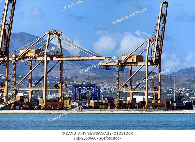 Africa, Mauritius, coast of Indian Ocean, Port Louis container terminal in foreground, Port Louis city in background