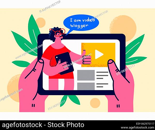 Person hold tablet gadget watch video blogger online. Woman use pad follow vlogger enjoy tutorial or vlog on internet. Social media and technology concept