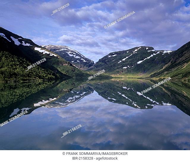 Reflection of mountains in water, Leirdalen, near Lom, Oppland, Norway, Scandinavia, Europe