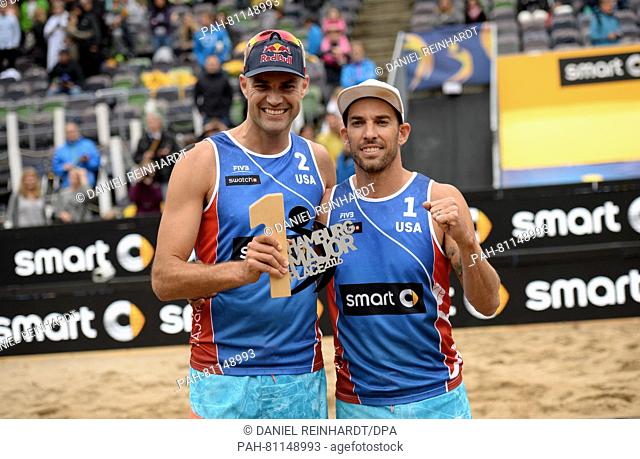 Nicholas Lucena (R) and Philip Dalhausser of the USA celebrate after winning the final against Brouwer and Meeuwsen of the Netherlands at the Beach Volleyball...