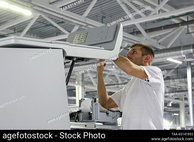RUSSIA, MOSCOW - NOVEMBER 24, 2023: A worker is seen at a production facility manufacturing BFS cash machines at Moskva Technopolis
