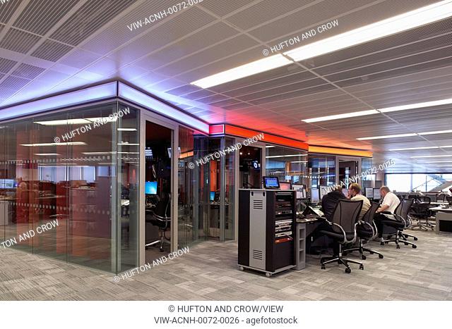 BBC Broadcasting House, London, United Kingdom. Architect: HOK International Ltd, 2012. Open plan work area with control studios