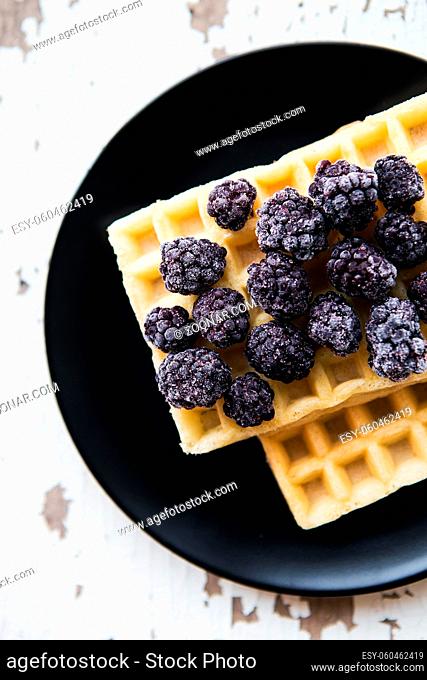 Delicious and beautiful Belgian waffles with blackberries